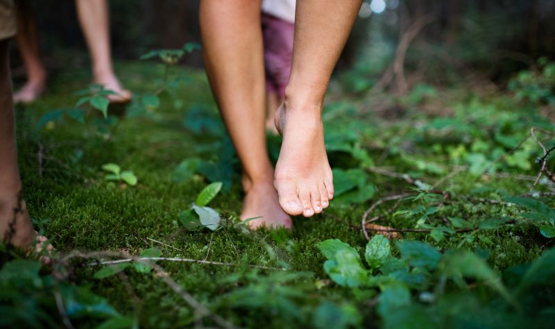 bare-feet-of-family-with-small-children-standing-b-2021-08-31-14-40-54-utc.jpg